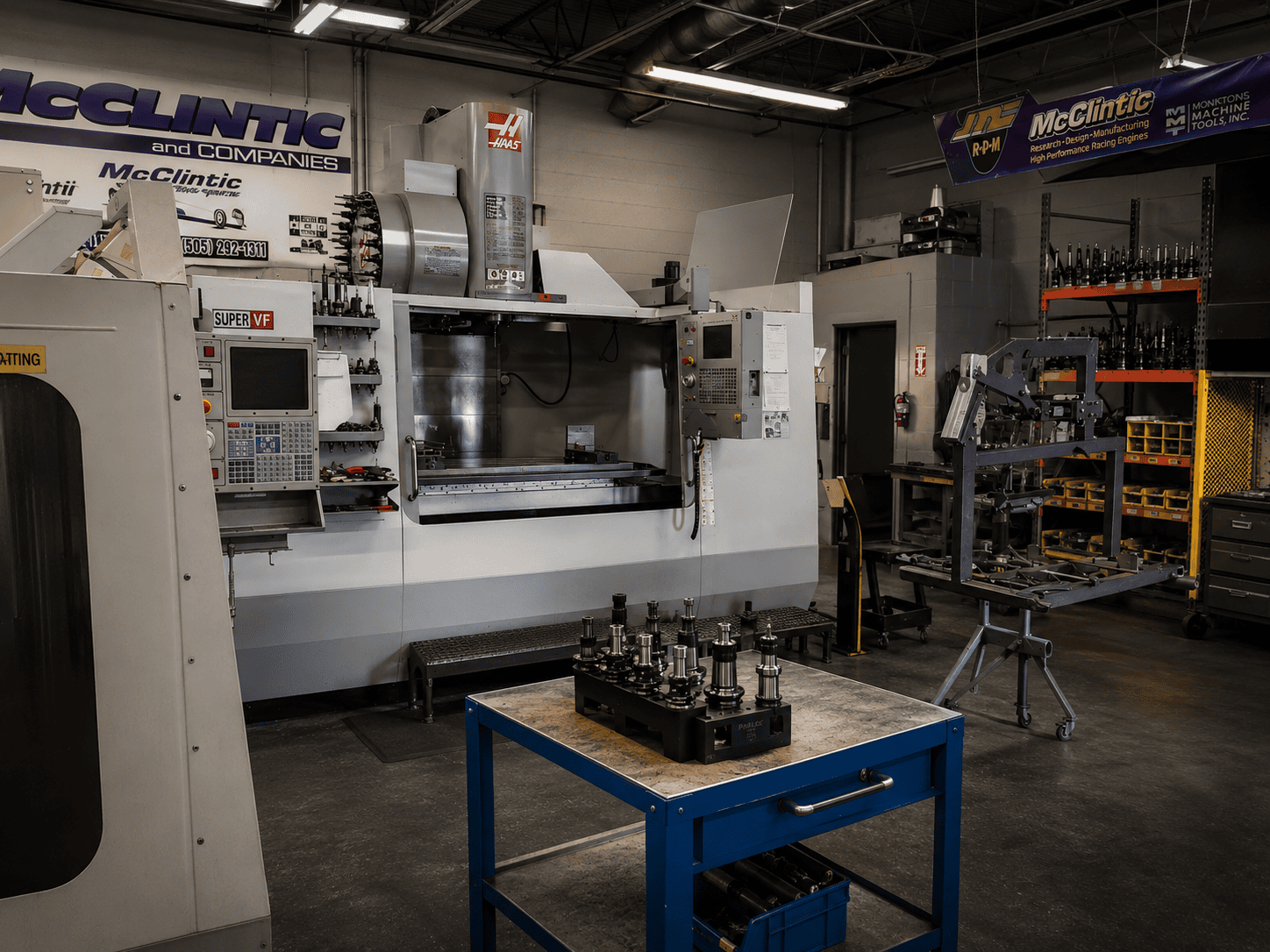 Precision CNC machining floor in Albuquerque with metal parts and industrial equipment